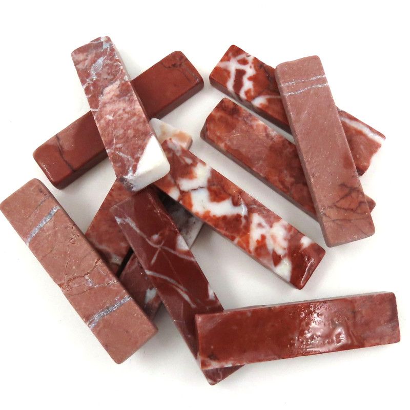 Marmurowe pręty zachód słońca czerwony