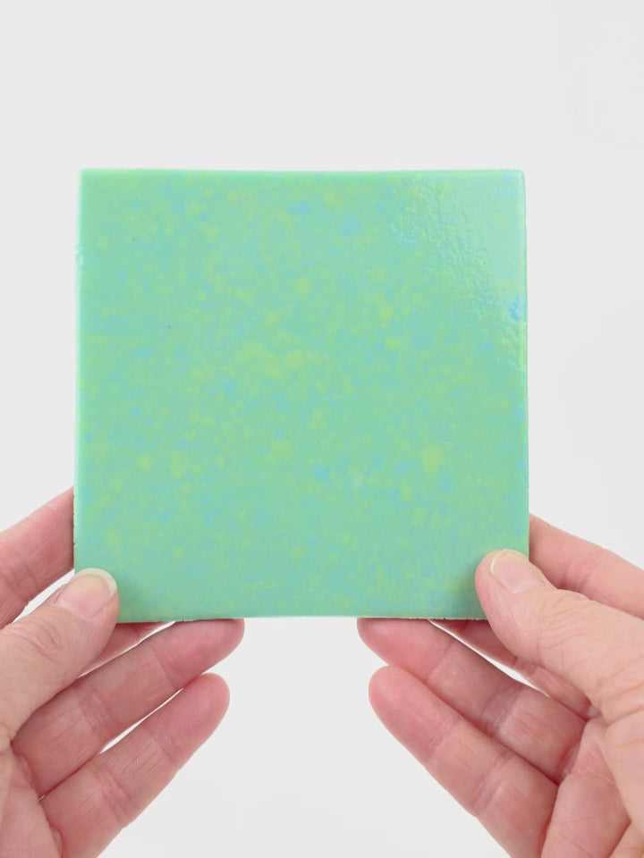 Video showing Morasutti Smalti mosaic tile – green_blue – 11.5 x 11.5 cm, rotated to show full tile