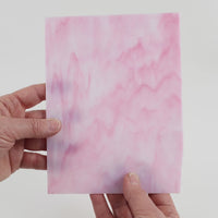 Video of the peony glass plate in translucent pink, 15x19cm, held up and tilted to show its pattern and transparency